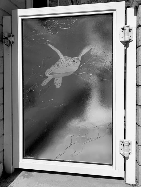 Etched and Cast Glass Gate Panel with Sea Turtle and Ocean Kelp Design for Laguna Beach Home