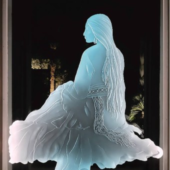 Etched glass panel of “Indian Maiden in traditional dress. Panel is 42” x 70” with LED lighting to illuminate the figure. Job is in La Quinta, California