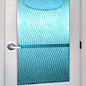 Cast Blue Glass bathroom door for residence in Solana Beach, California