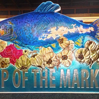 Two inch thick cast glass sign with glass stain coloring hand painted into it, for The Fish Market Restaurant San Francisco, California