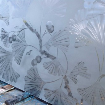 Large “gingko panel” for privacy wall in custom home.  Actual size is 50” x 86”. The etched divider panel adds a flair to the rooms it separates.