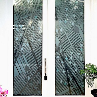Glass Doors Etched on Both Sides to Provide Depth and Interest in the Design